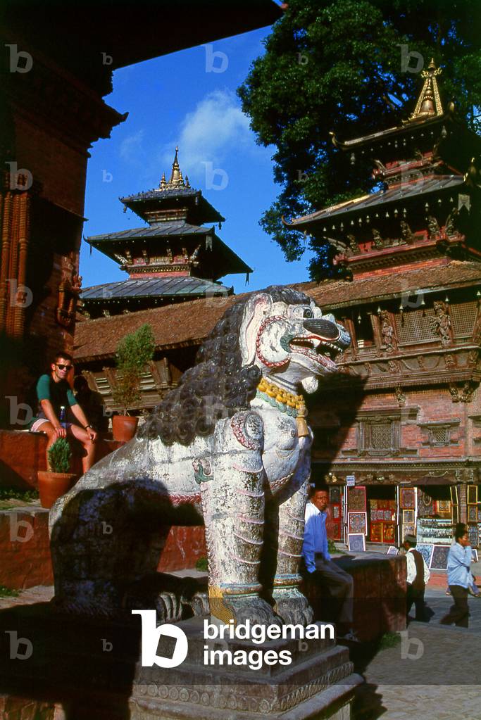 Nepal: Mythological lion guarding the entrance to the Shiva Parvati Temple, Durbar Square, Kathmandu