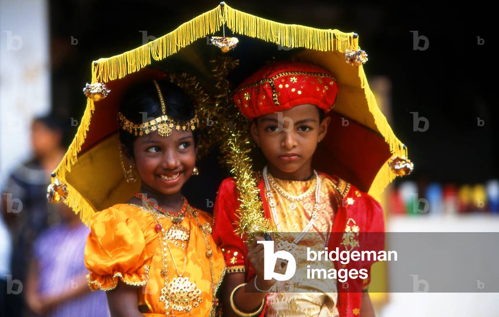 Sri Lanka: Two children dressed as Sri Lankan nobility at a temple festival in Avissawella
