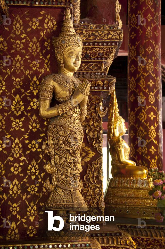Thailand: A thewada (angel) on the mondop within the Ubosot (bot), Wat Phra Singh, Chiang Mai
