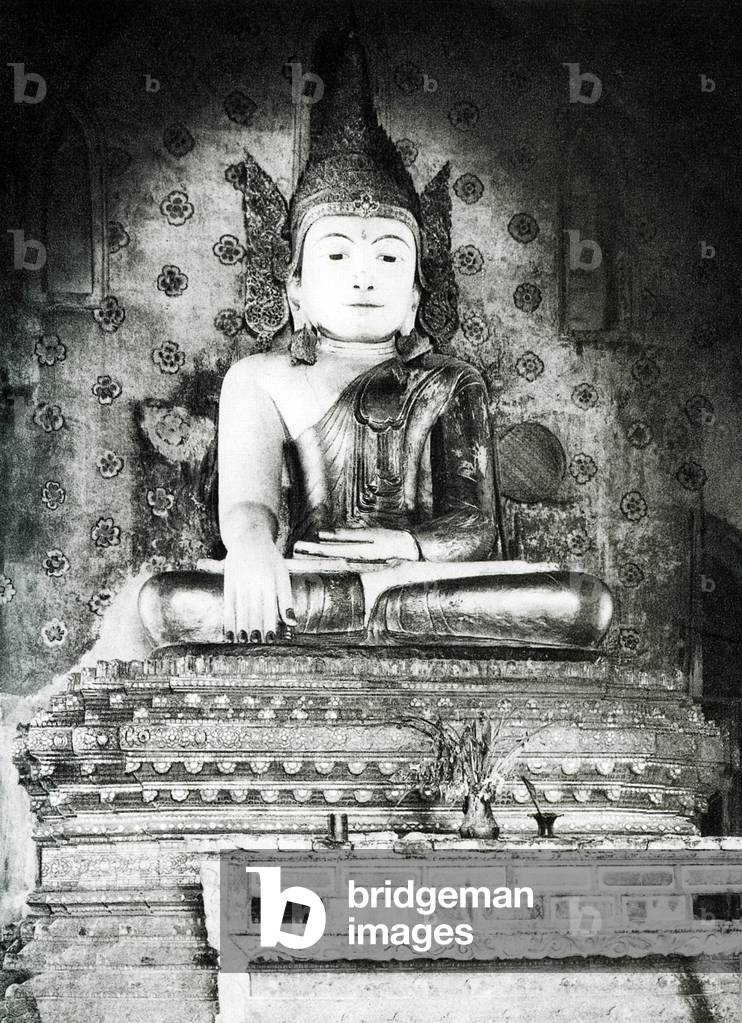 Burma/ Myanmar: A Buddha statue in a temple near Ava, Upper Burma, c.1920s.