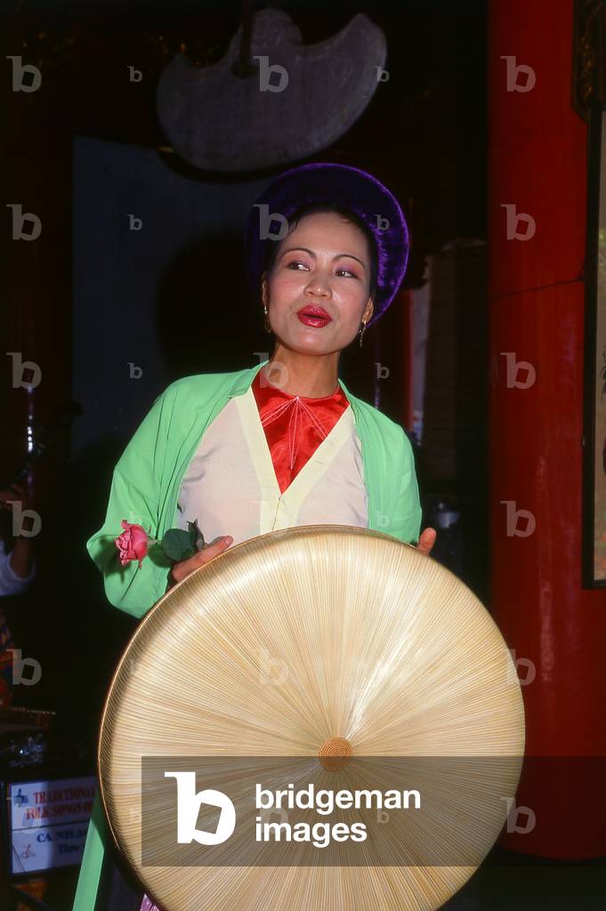 Vietnam: Singer with a traditional Vietnamese orchestra at Van Mieu (the Temple of Literature), Hanoi