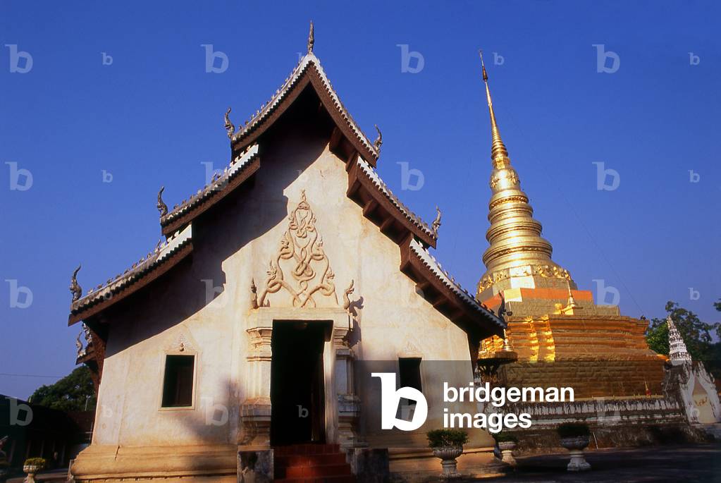 Thailand: The gilded chedi and viharn of Wat Phra That Chae Haeng, Nan, North Thailand