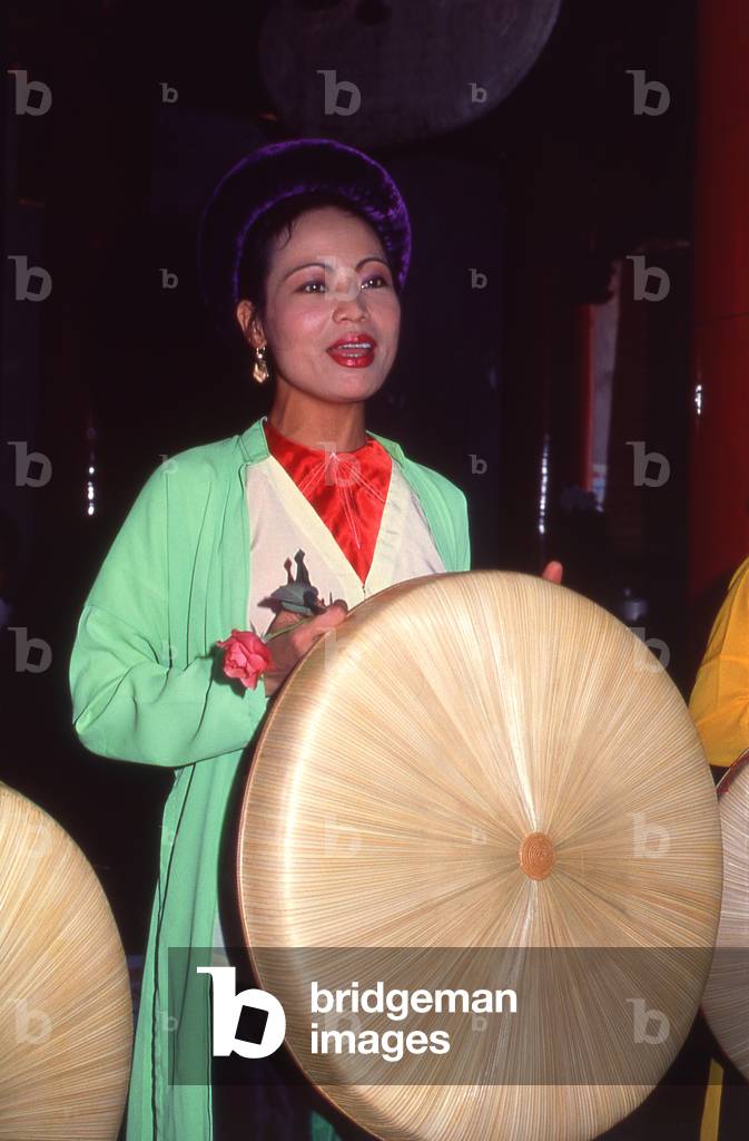 Vietnam: Singer with a traditional Vietnamese orchestra at Van Mieu (the Temple of Literature), Hanoi
