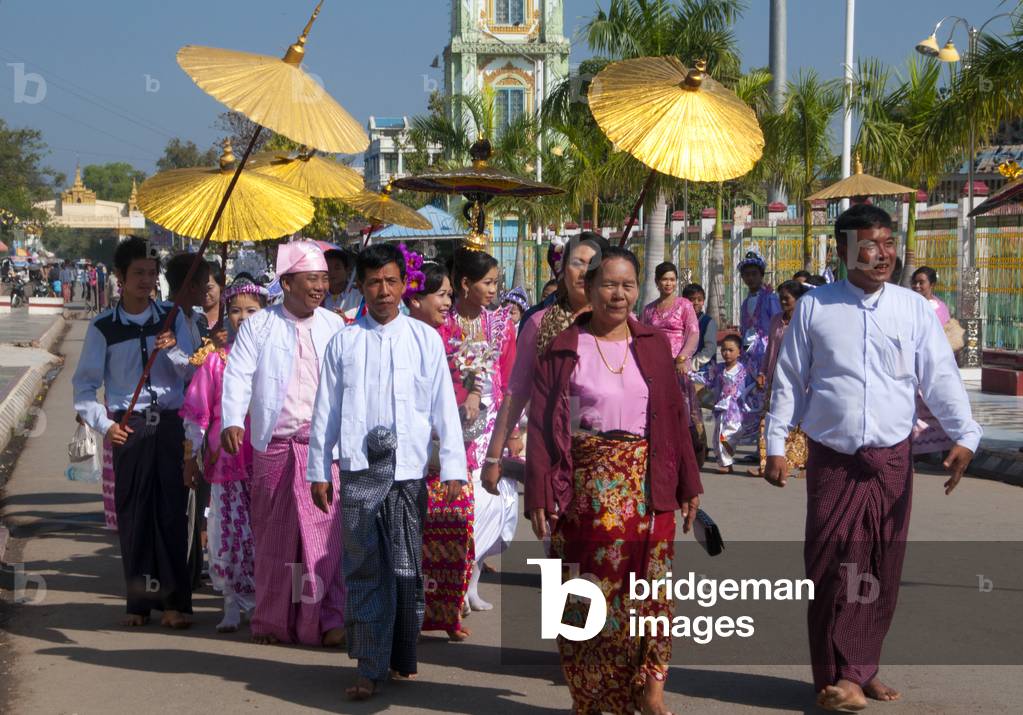 Burma / Myanmar: A wedding party in procession to the Maha Muni Pagoda (Great Sage Pagoda), Mandalay