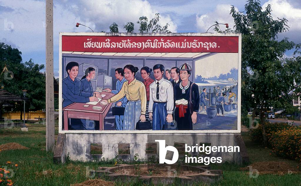 Laos: Revolutionary Socialist realist-style political poster on the streets of Vientiane