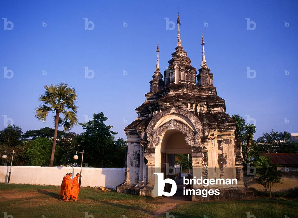 Thailand: Monks at the gateway into Wat Suan Dok, Chiang Mai, northern Thailand