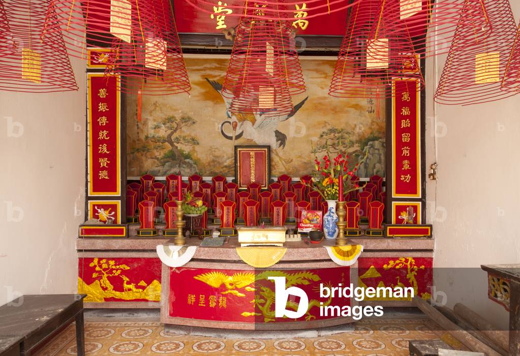 Vietnam: A side altar with coils of incense in the Assembly Hall of the Cantonese Chinese Congregation (Quang Trieu), Hoi An (photo)