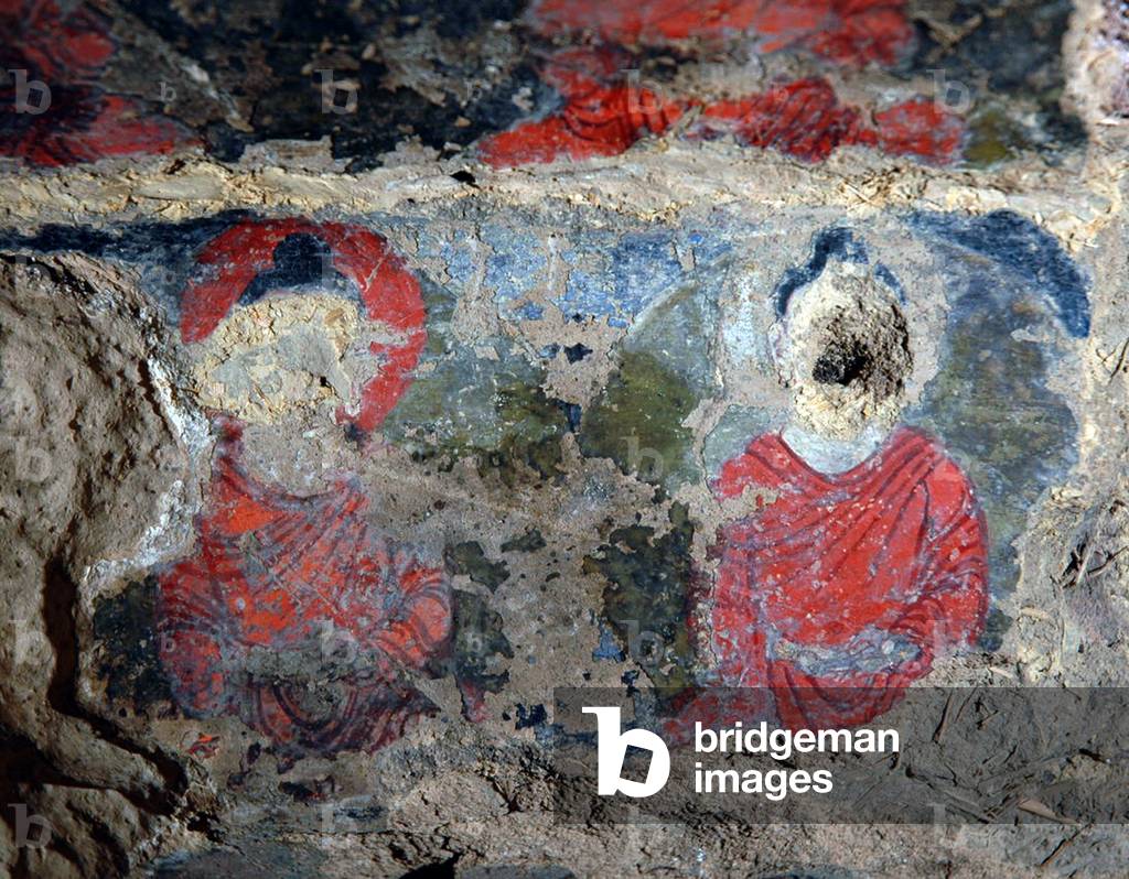 Afghanistan: Mural images of two Buddha figures or bodhisattvas from a cliff cave at Bamiyan, c. 7th century CE, subsequently defaced, probably by Muslim iconoclasts (photo)