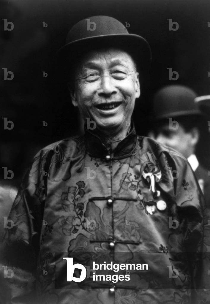 USA: Smiling Chinese man. New York Chinatown, 1915