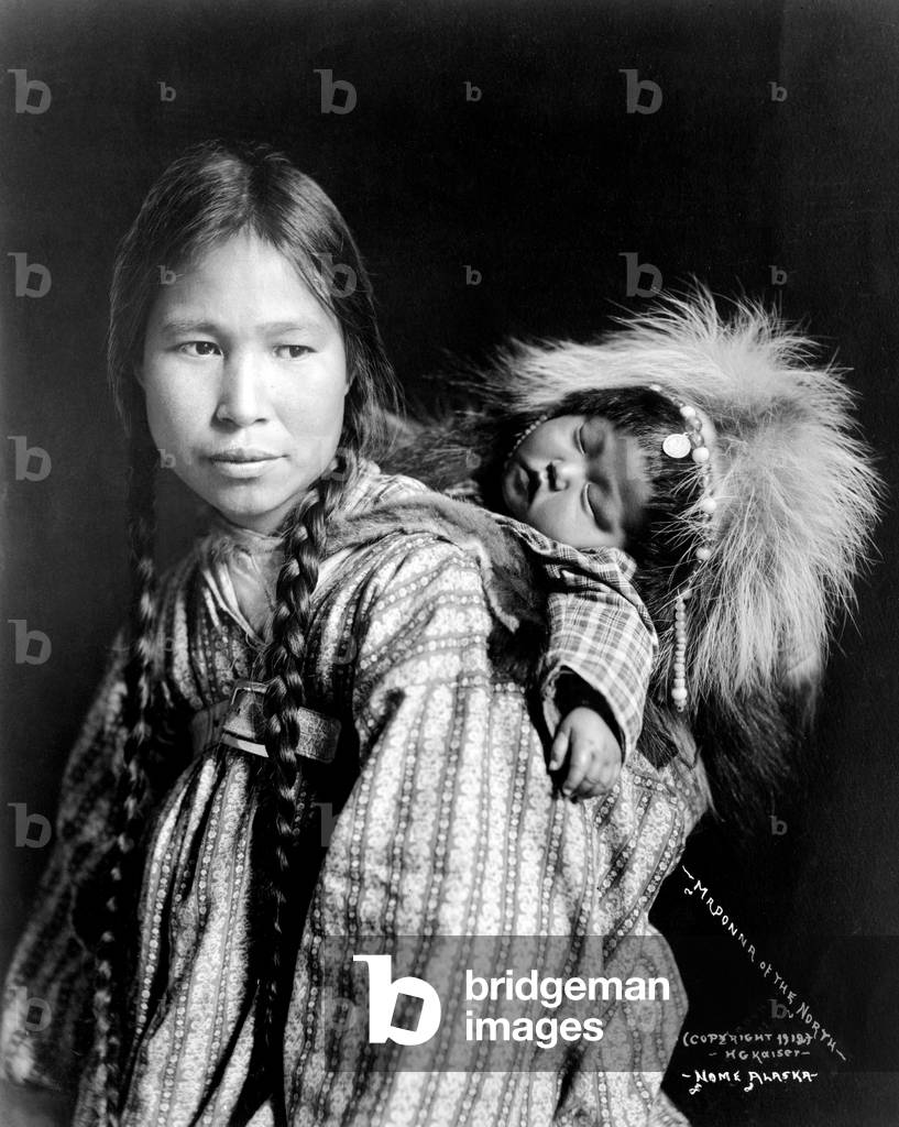 USA / Alaska: 'Madonna of the North'. An Inuit woman and child, Nome, 1912