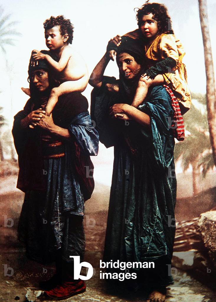 Palestine: Bedouin women carrying children on their shoulders. Felix Bonfils, late 19th century