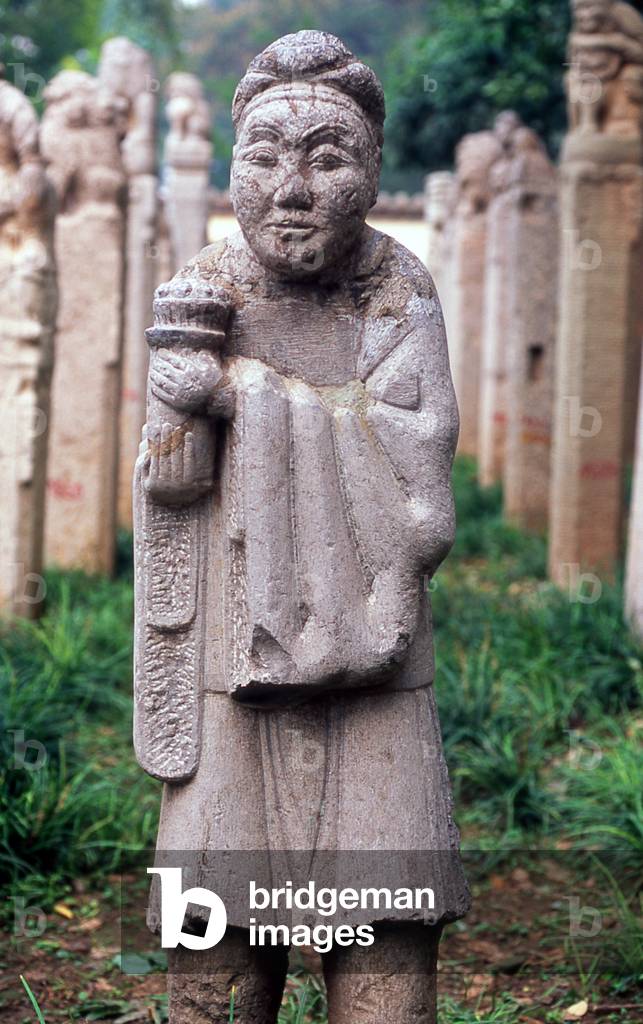 China: Stone figure in the stele garden at Xiaoyan Ta (Little Wild Goose Pagoda), Xi'an, Shaanxi Province