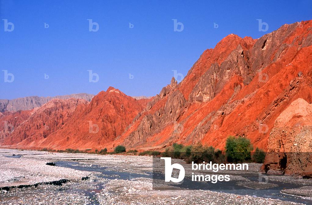 China: The red mountains of the Ghez River (Ghez Darya) canyon, Karakoram Highway