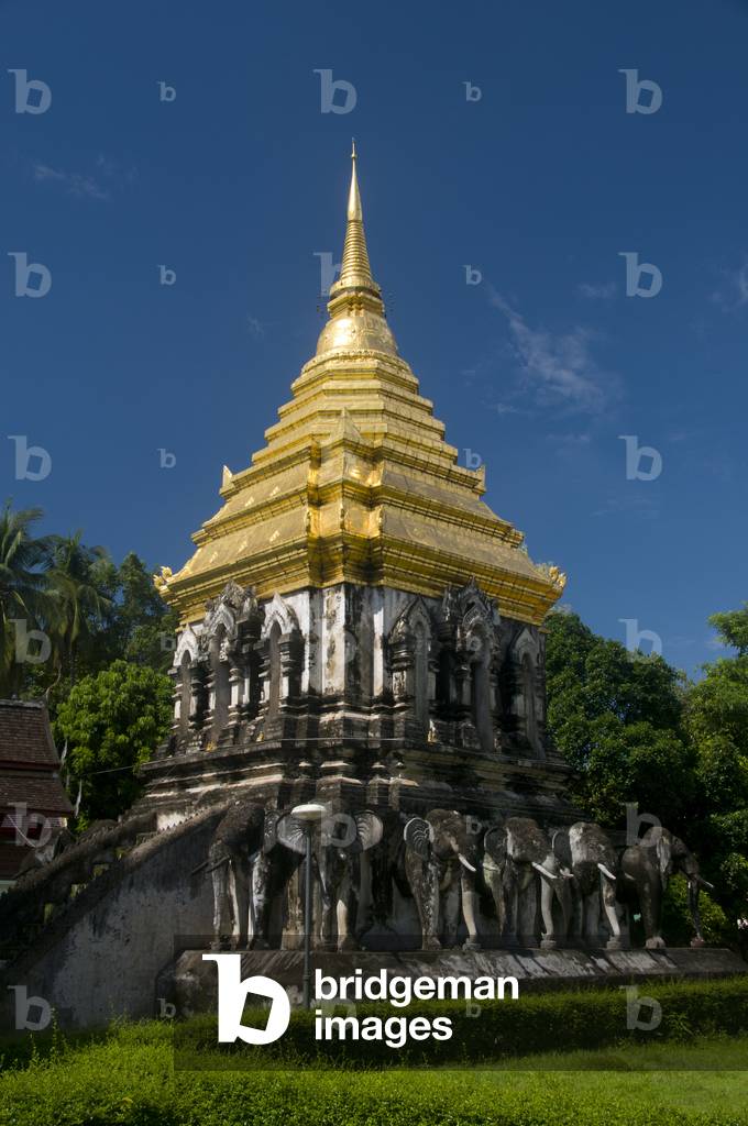 Thailand: Gilded Chedi Chang Lom surrounded by Sukhothai-style elephants, Wat Chiang Man, Chiang Mai