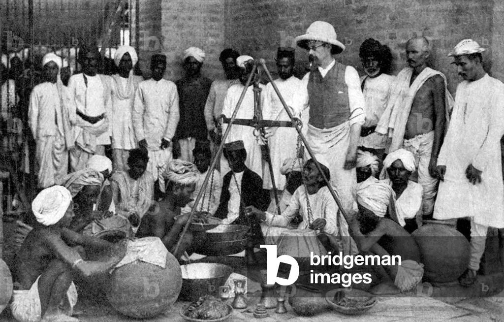 India: Weighing opium at a government factory in India, late 19th century