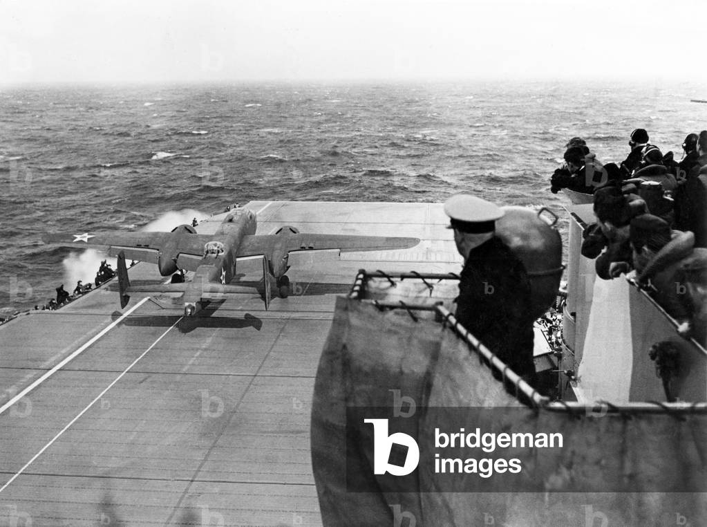 USA / Japan:  Lt. Col. James 'Jimmy' Doolittle performs a full-throttle takeoff in a B25 Mitchell Medium Bomber from the deck of the USS Hornet, 650 miles from Japan, for the 'Doolittle Raid' on Tokyo, 18 April 1942