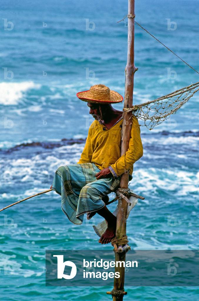Sri Lanka: Stilt fisherman, Weligama (photo)