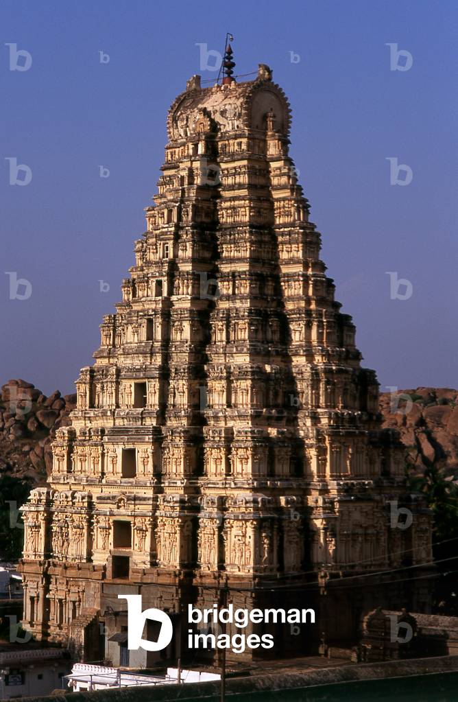 India: The Eastern tower (gopuram) rises above the Virupaksha Temple, Hampi, Karnataka State