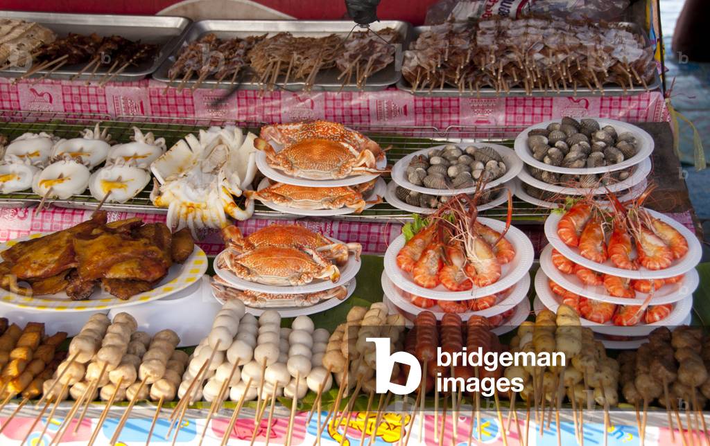 Thailand: A selection of seafood and barbecue sticks at a stall near Wat Ko Loi, Sri Racha, Chonburi Province
