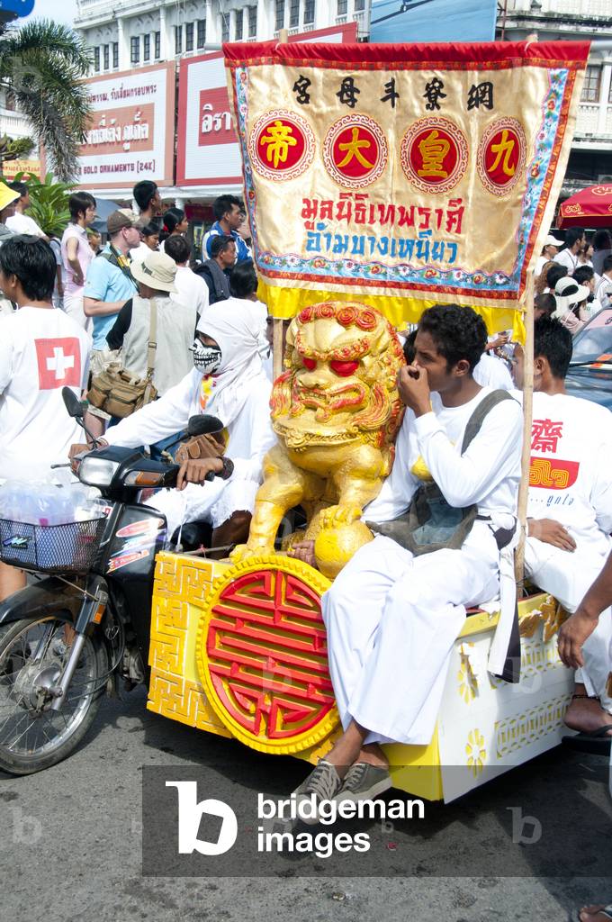Thailand: A Chinese temple's lion statue is paraded through Phuket Town's streets, Phuket Vegetarian Festival