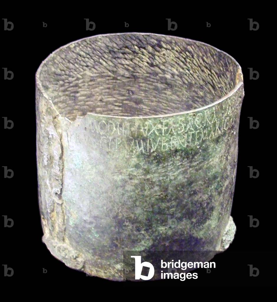 Spain: A bronze Roman modius measure with inscription recording Imperial regulation of weights and measures. Galicia, 4th century CE