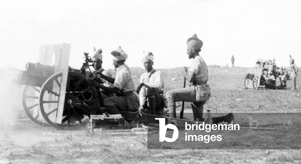 Palestine: British Indian Army troops firing a 3.7 inch gun battery, Jerusalem, 1917