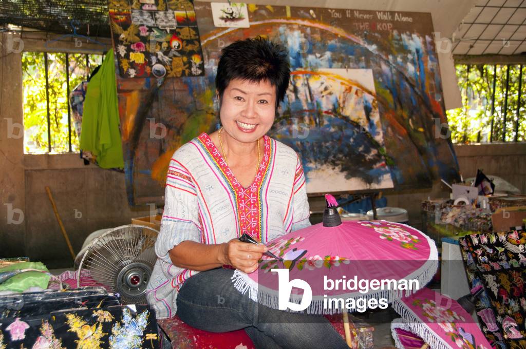 Thailand: Decorating the umbrella, Bo Sang Umbrella Village, near Chiang Mai, northern Thailand
