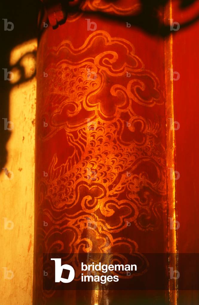 Vietnam: Late afternoon sunlight catches a dragon pillar at the Taoist Quan Thanh Temple dedicated to Tran Vu (God of the North), Hanoi