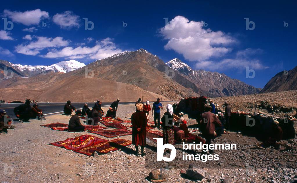 China: Kirghiz carpet traders, Karakoram Highway, Xinjiang