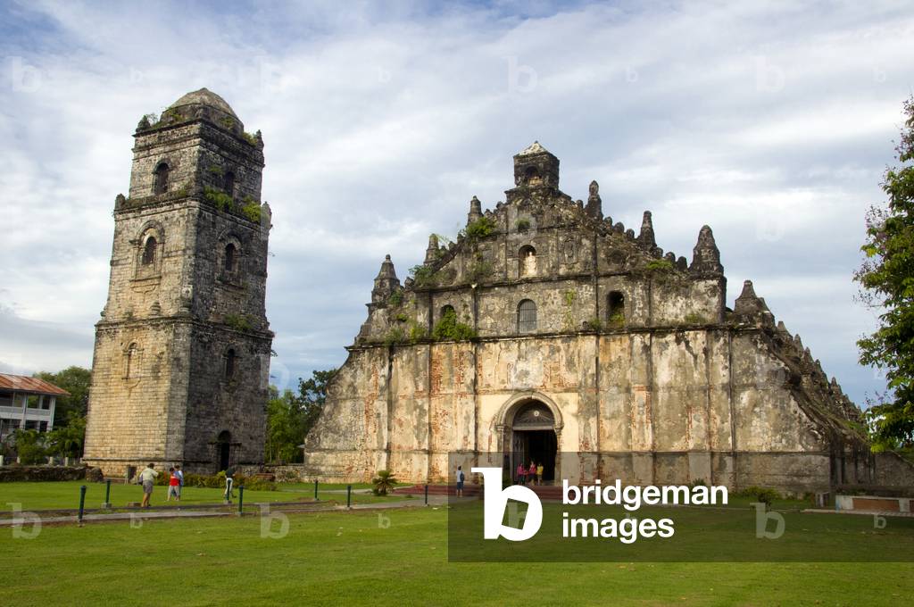 Philippines: Bell tower and church with its huge buttresses, San Agustin (St. Augustine) Catholic Church, Paoay, Ilocos Norte, Luzon Island