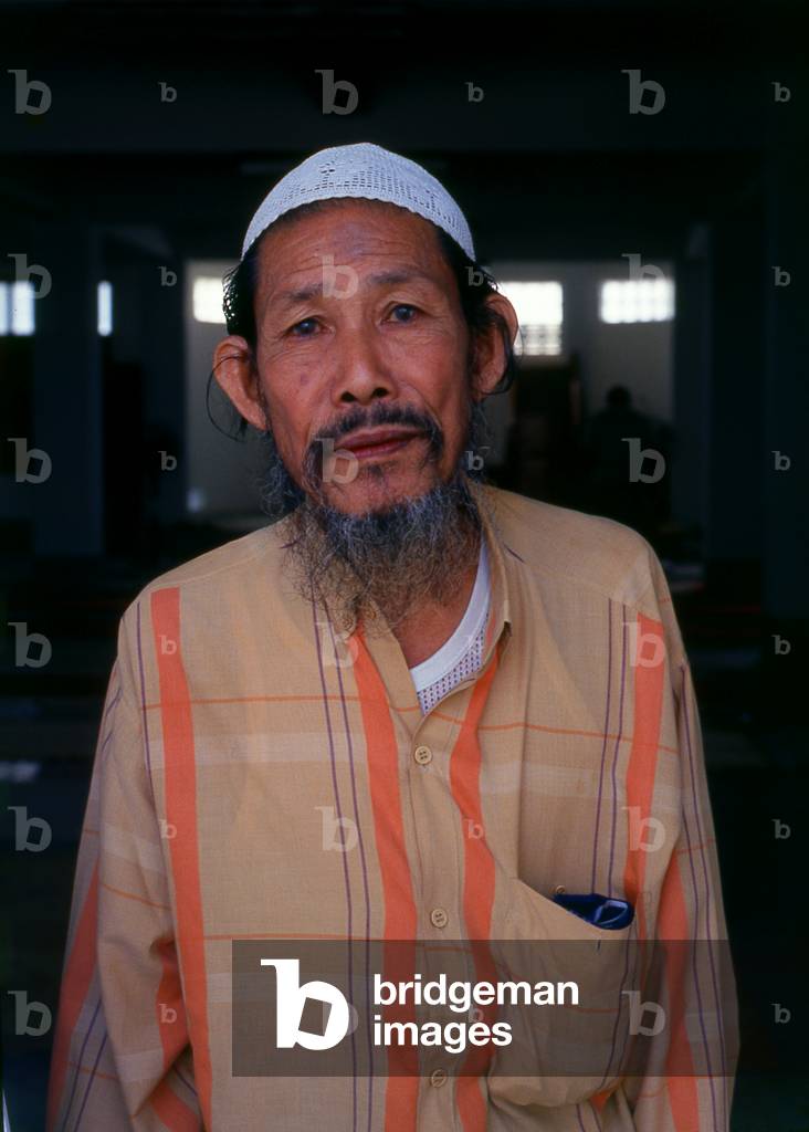 Burma: Haw Muslim man and in the mosque at Tachilek, Shan State, Burma
