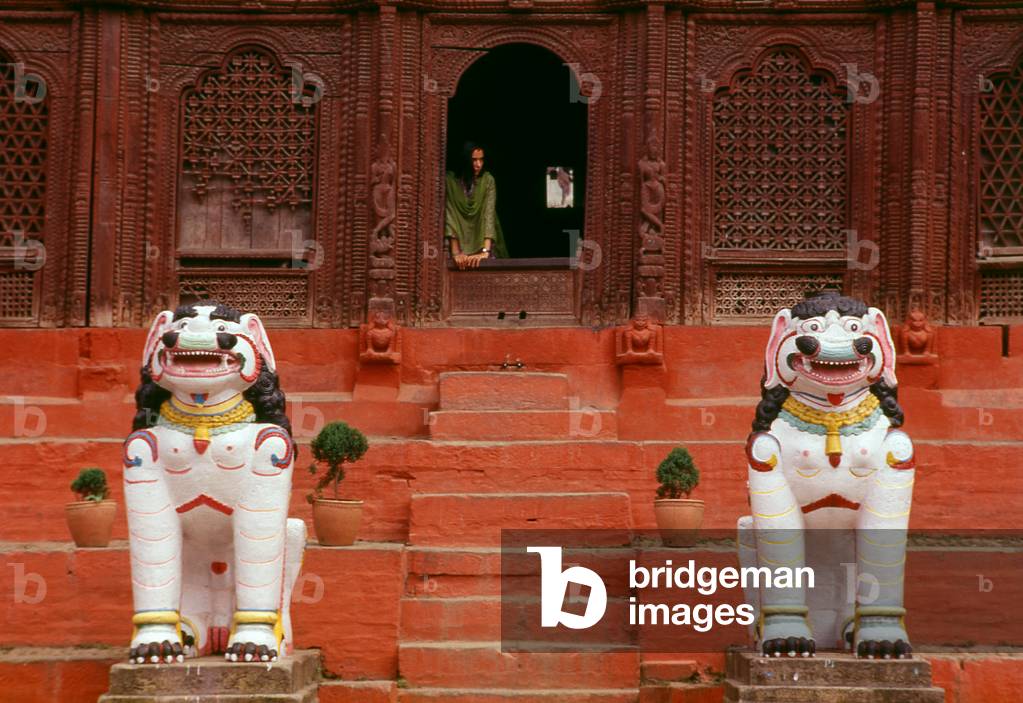 Nepal: Mythological lions guarding the entrance to the Shiva Parvati Temple, Durbar Square, Kathmandu