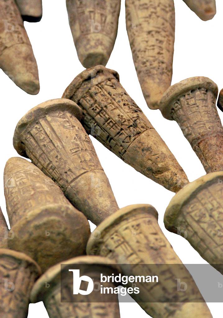 Iraq: Cuneiform-inscribed baked clay coins from the National Museum, Baghdad, c. 2,600 BCE