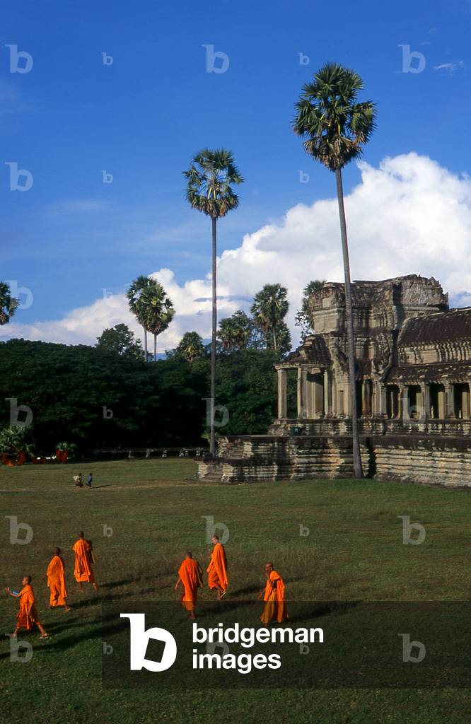 Cambodia: Monks leaving the central sanctuary at Angkor Wat