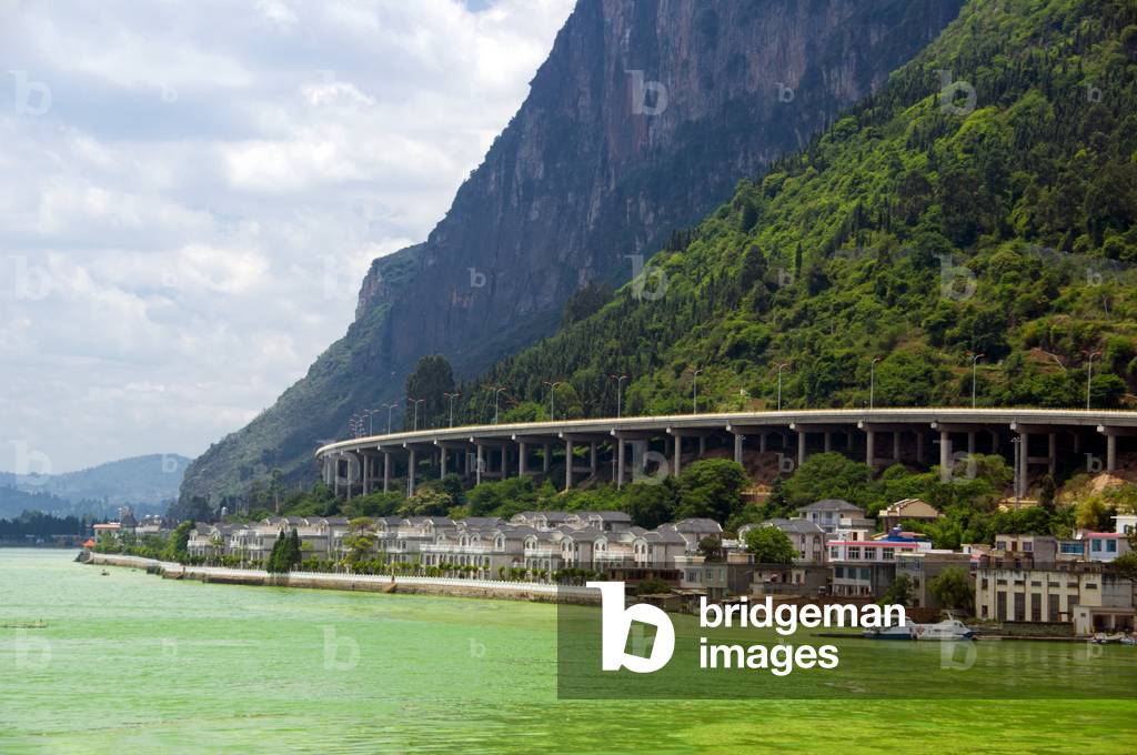 China: Highway running below the Western Hills (Xishan), near Kunming, Yunnan Province