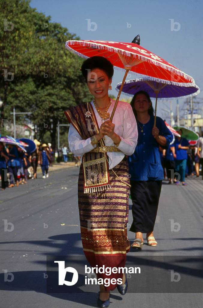 Thailand: Khon Muang (Northern Thai) woman parading in her finery, Chiang Mai Flower Festival Parade, Chiang Mai, northern Thailand