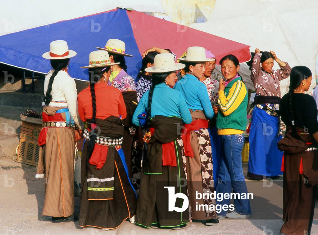 China: Tibetans in the market near the Labrang Monastery, Xiahe, Gansu Province