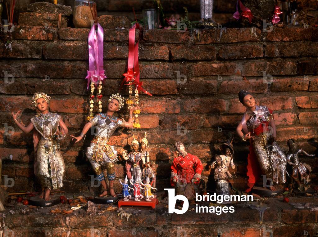 Thailand: Thai traditional dancer dolls placed on a small chedi behind Wat Si Sanphet, Ayutthaya Historical Park