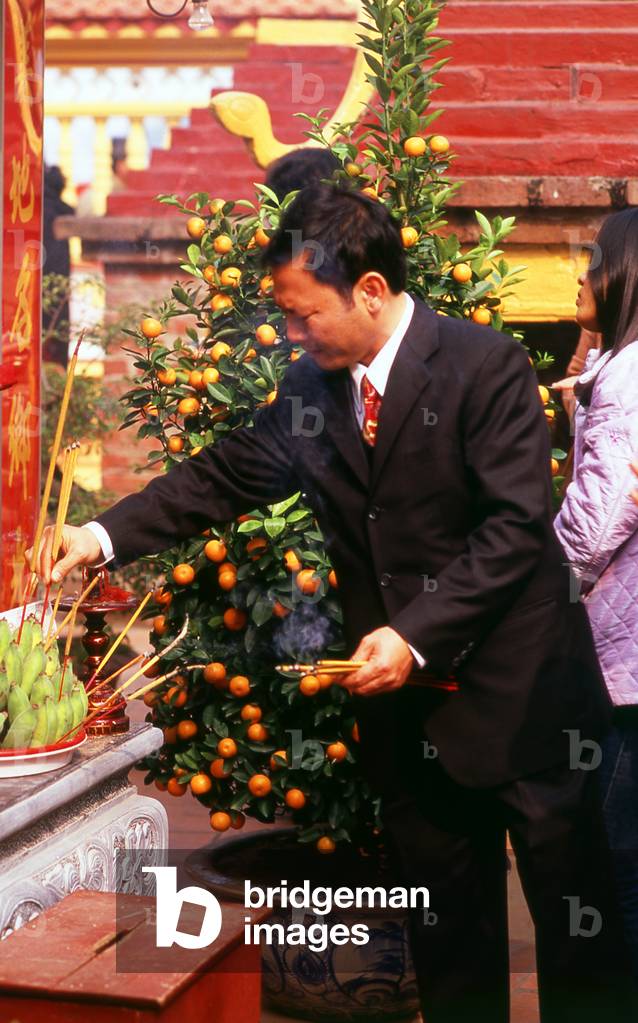 Vietnam: Tet celebrants at Tran Quoc Pagoda, Ho Tay (West Lake), Hanoi