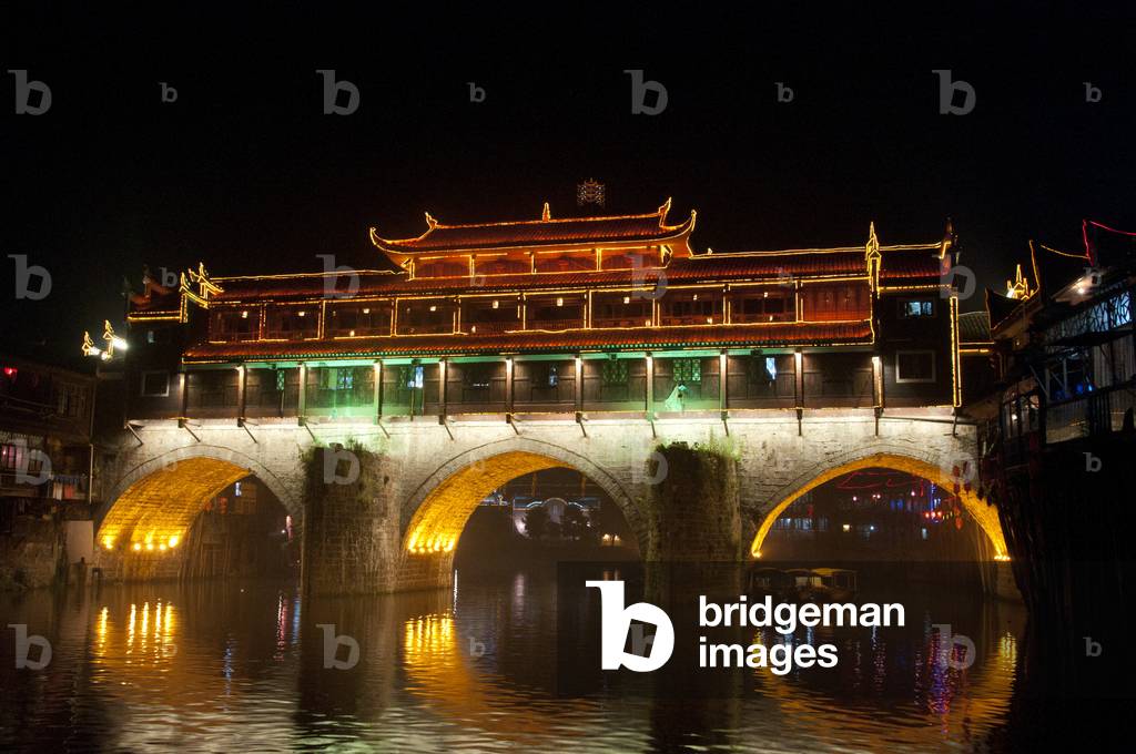China: Hong Qiao Bridge by night, Fenghuang's famed covered bridge, Fenghuang, Hunan Province