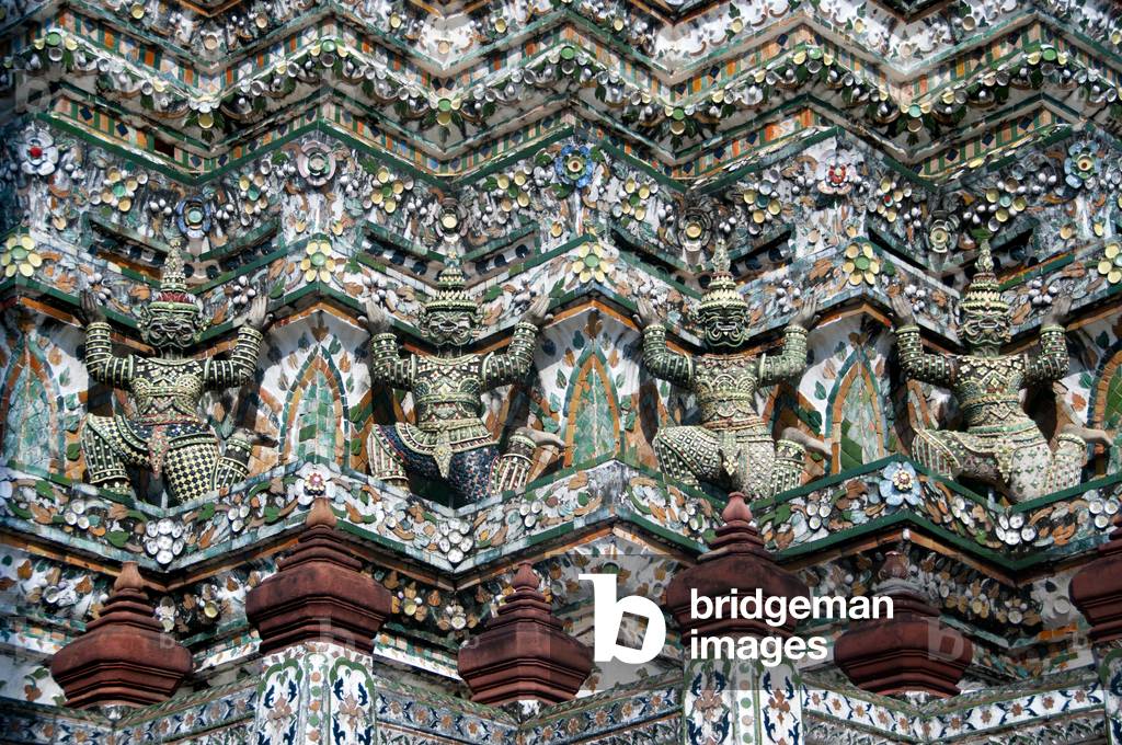 Thailand: Guardian figures or Yaksa on the Khmer-style central prang at Wat Arun (Temple of Dawn), Bangkok