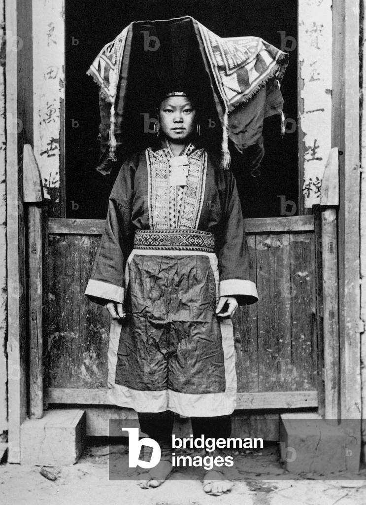 China: A Yao girl photographed on her wedding day in Yunnan province in 1925.