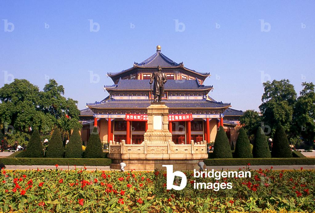 China: Dr Sun Yat-sen (1866-1925), founder of the Chinese Republic, stands in front of the Sun Yatsen Memorial Hall (Sun Zhongshan Jiniantang), Guangzhou (Canton), Guangdong Province