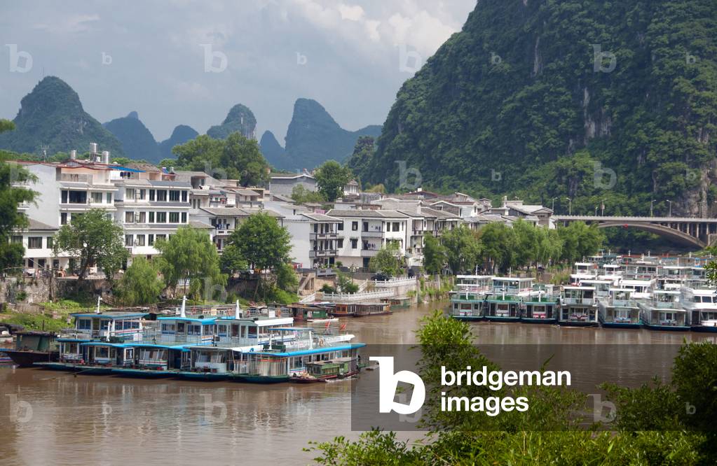 China: Boats on the Li River at Yangshuo, near Guilin, Guangxi Province