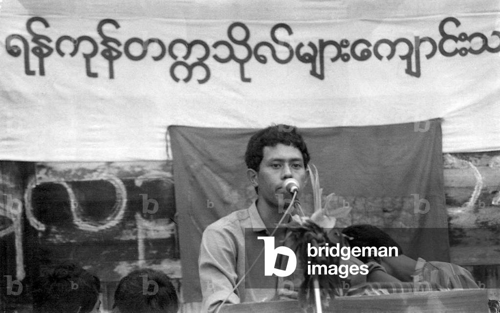 Student leader Moe Thee Zun addressing a rally, 1988 (b/w photo)