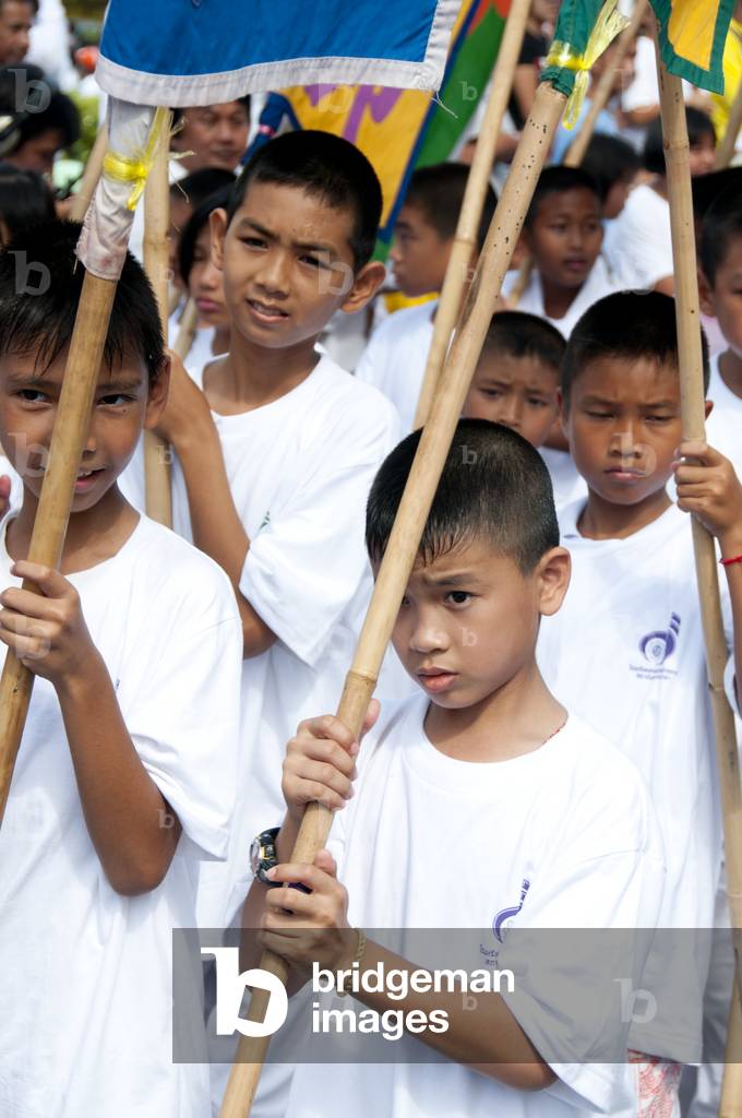 Thailand: Boys in the daily parade through Phuket Town during the festival, Phuket Vegetarian Festival