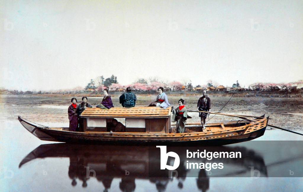 Japan: A group of geisha enjoying a boat ride somewhere in the Japanese countryside, 1886