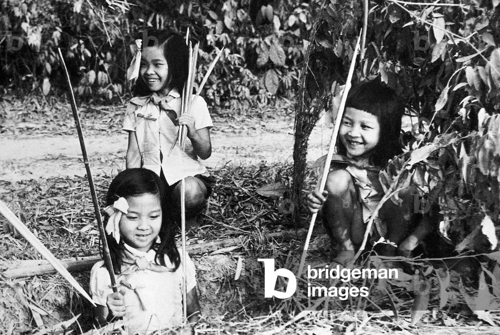Vietnam: Vietnamese Children making panji bamboo traps at Cu Chi, 1968