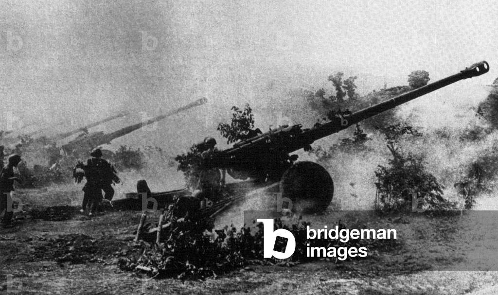 Vietnam: Soviet-supplied North Vietnamese army (NVA / PAVN) 122mm heavy artillery in action