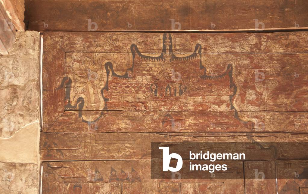 Thailand: Fading mural depicting 16th-century life on a wooden panel in Viharn Nam Taem, Wat Phra That Lampang Luang, northern Thailand